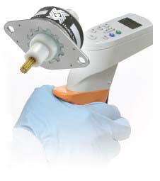 Small Stepper-Based Linear actuator in front of handheld electronic pipette